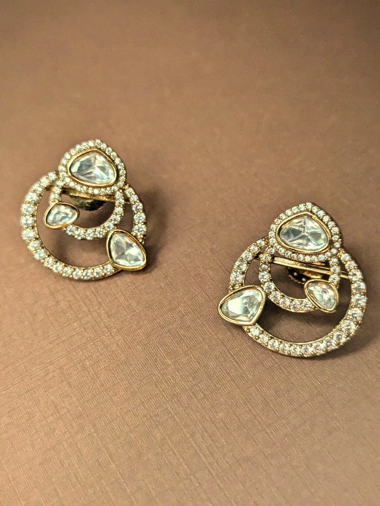 Polki Spiral Stud Earrings in Gold Finish